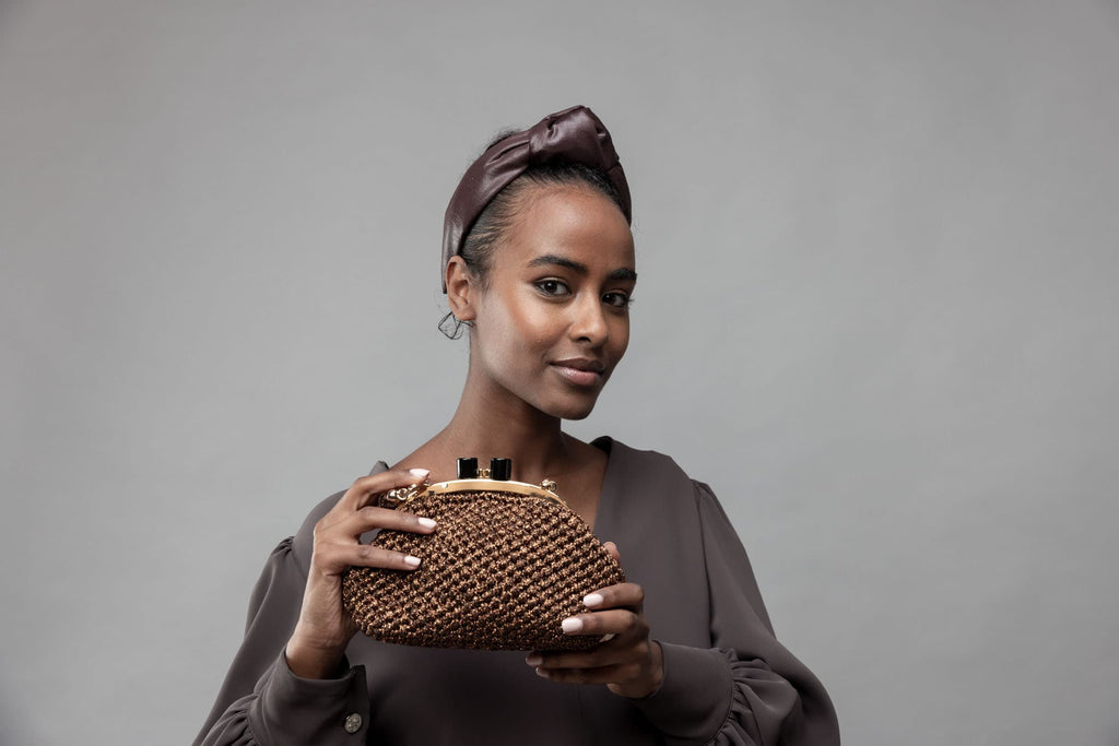 Clutch "Costiera" tricot marrone lurex